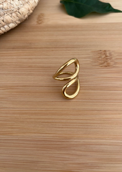 Bague femme en acier inoxydable doré, réglable avec deux anneaux qui de croisent sur le dessus 