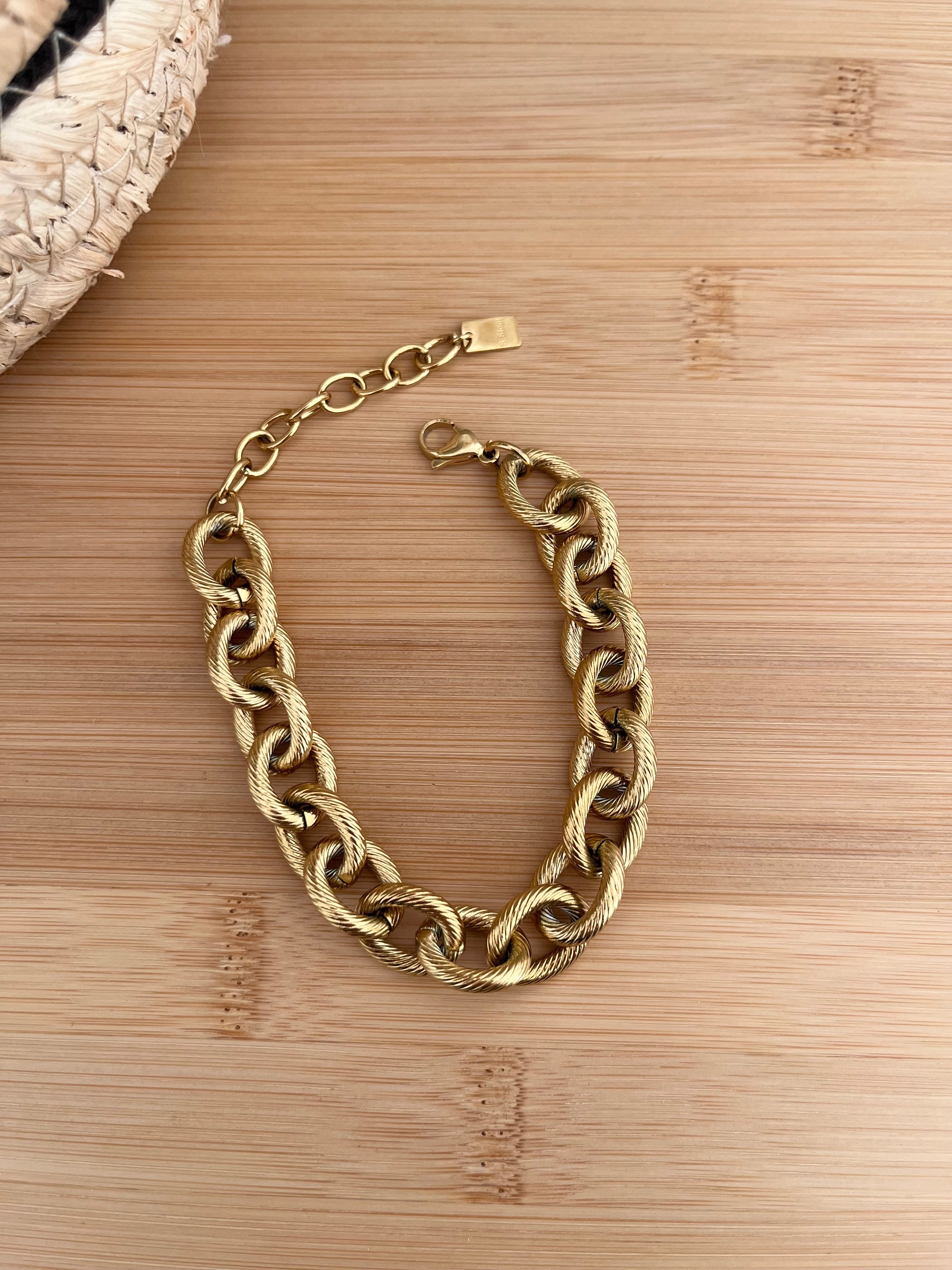 Bracelet chaîne maillons, aspect texturé de petits traits, en acier inoxydable doré